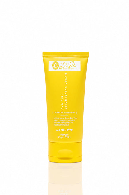 Yellow tube of skincare cream on a white background